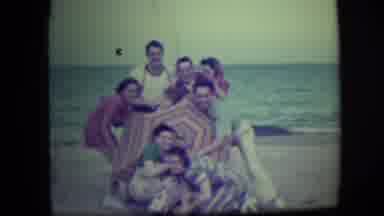 Long Beach New York (1946): A Group Of People Posing At The Beach And All Fall