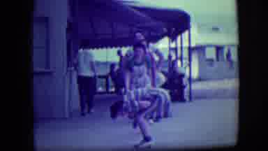 Long Beach New York (1946): Friends Playing Outside Hopping One Over The Other