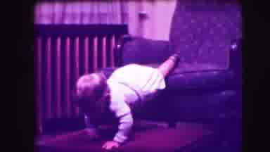 Cliffside Park New Jersey (1942): A Baby Girl Crawls Cautiously Out Of A Chair