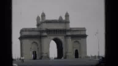 Bombay India (1946): People Walk Around The Outside Of The Large Historical