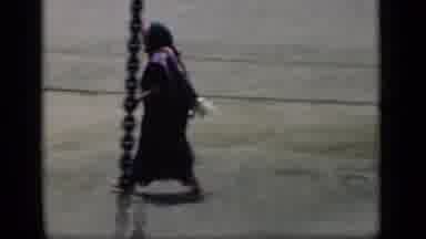 Bombay India (1946): A Man And A Woman Walking Down The Empty Road