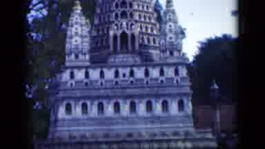 Bombay India-1946: Ornate Temple With Golden Spire Surrounded By Trees