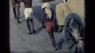 Bombay India (1946): People In An Indian Village Walking And Pulling And Pushing