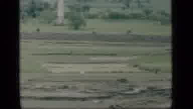 Bombay India (1946): View Of Boats In Water And Green Fields On A Clear Day