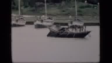 Bombay India (1946): Several Oarsmen Rowing A Traditional Asian Wooden Boat Down