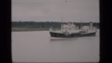 Bombay India (1946): Small Boat Driving Down Lake