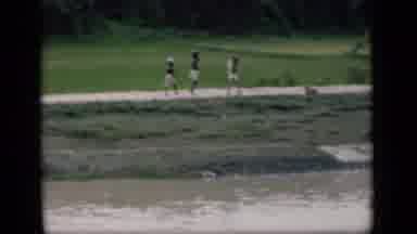 Bombay India (1946): Young Men's Walking On A Riverside