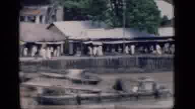Bombay India (1946): Rustic View Of Rustic Buildings And People Walking Around