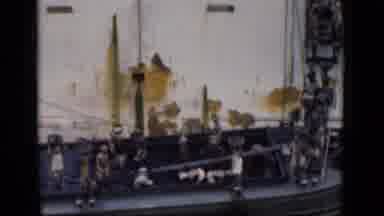 Bombay India (1946): People Climbing Ladder Carrying Baskets Off Boat On Water To