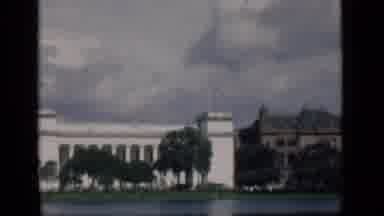 Bombay India (1946): White Brown Architecture Blue Sky City Vintage Traffic Trees