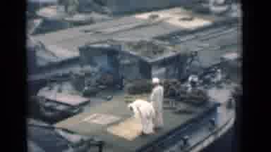 Calcutta India (1946): Two Men In White Muslim Outfits Stand Among The Smoldering