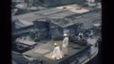 Calcutta India (1946): Two Men Dressed In White One Kneels To Pray Something In