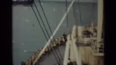 India (1946): Some Is Filming From A Vesicle In The Water A Large Ship Across The