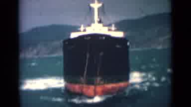 India (1946): Ship At Sea Rocks Around By Waves Scene Of Sun And Clouds In Sky
