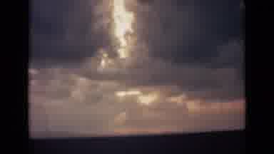 India (1946): Sky And Clouds Then Shot Of Sunset Over A Hill From Afar