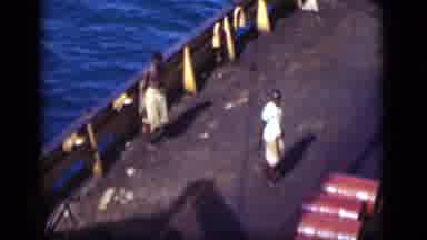 Suez Canal Egypt (1946): Two Shirtless Men Rolling Barrels On The Deck Of A Large