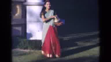 India (1947): Woman In Authentic Cultural Garment Sets Large Piece Of Pottery On