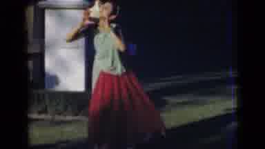 India (1947): An Indian Woman Dancing In A Beautiful Sari Outside