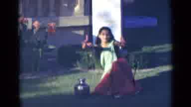 India (1947): A Hindu Indian Woman Sitting On The Grass With A Bottle