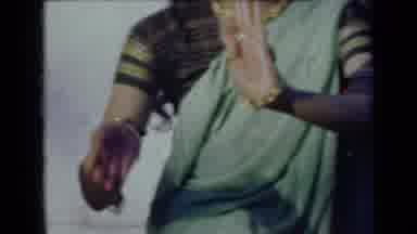 India (1947): Indian Woman In Traditional Garb And Wearing Jewelry Moves Her Hands