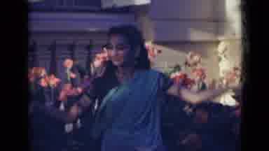 India (1947): Indian Girl Dancing Infront Of Flowers In A Garden