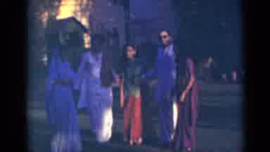 India (1947): Two Men And Three Women All Dressed In Similar Clothing Walk