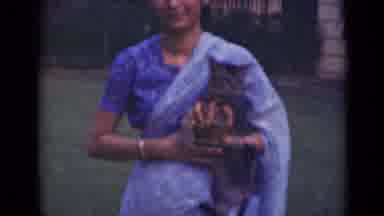 India (1947): Young Asian Females One Holding A Baby And The Other A Cat While Two