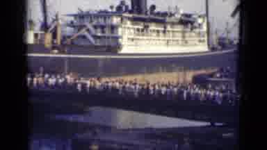 India (1947): Hundreds Of People In Line Walking To Board Boat