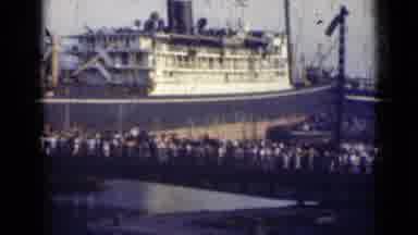 India (1947): Crowd Of People Entering And Exiting A Ship In A Dock