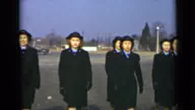 New York (1947): Uniformed Women In Black Marching Together In A Public Place