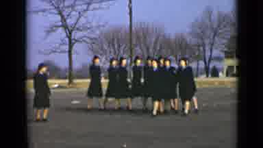 New York (1947): Group Of Women Wearing Black Uniforms Marching In Synchronized