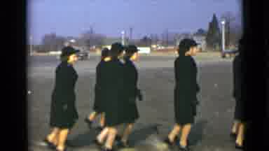New York (1947): Young Women In Uniform Walking And Performing Across Parking Lot