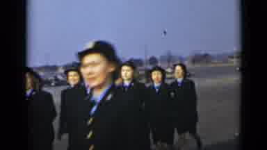 New York (1947): Women In Blue Uniforms And Hats Run Or March And Stand In