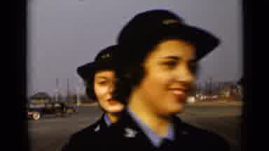 New York (1947): A Line Of Women In Uniform Walk Towards The Viewer And Disperse