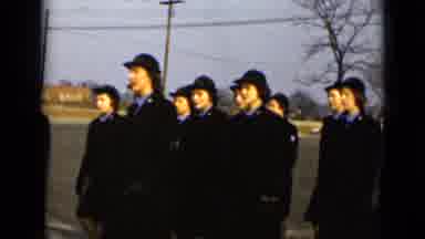 New York (1947): Woman In Black Uniforms Marching In Formation In Large Parking