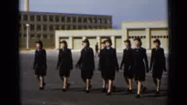 New York (1947): A Group Of Women March Together In Black Uniforms With Matching