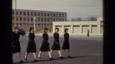 New York (1947): Uniformed Women In Black Dresses Marching In Synchrony On The