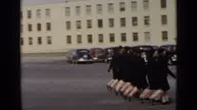 New York (1947): Women Marching In Sync In A Parking Lot In Front Of A Large