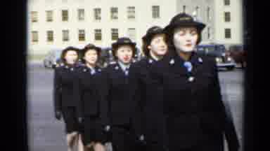 New York (1947): Woman In Black Uniforms Marching In Formation In Large Parking