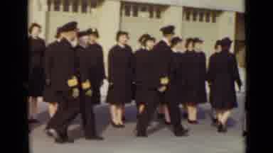 New York (1947): Men And Women In Uniform Line Up Together And March While Some