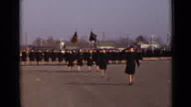 New York (1947): Women In Black Long Coats Salute And March Together In Rows