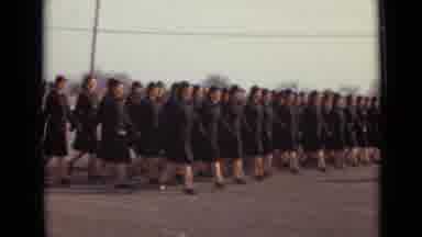 New York (1947): A Regiment Of Women In Black Uniforms Marching In Sync