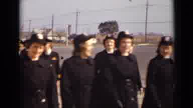 New York (1947): Group Of Men In Military Uniforms Walking Through A Parking Lot