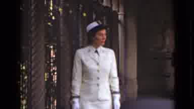 New York (1947): A Lady Walking Around In A White Suit And Gloves That Is Worn By