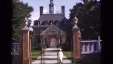 New York (1947): Vintage Video Of A Woman Passing Through The Gate Of A Large