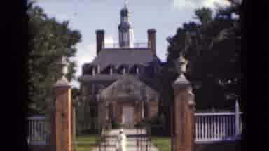 New York (1947): Woman Dressed In White Walking Up To A Large Mansion Style House