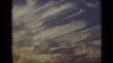 NEW YORK-1947: Wide Angle View Of Clouds In A Blue And Purple Sky