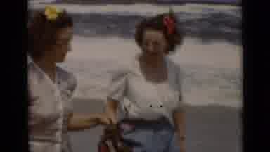 New York (1947): Women Walking On The Windy Beach Together In The Daylight