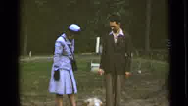 New York (1947): Two People Playing With Dog And Petting It