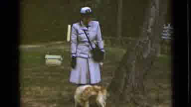 New York (1947): An Official Woman Walking Her Dog On The Park Before She Goes To